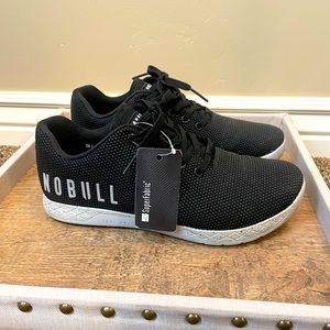 Black ‘no bull’ shoes. Speckled sole with tags